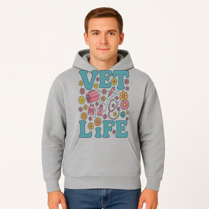 Vet Life Graphic Tee | Colorful Vet Inspired T-Shirt with Pet Icons and Flowers | Perfect Gift for Animal Lovers and Vets - Hoodie 1758347423317.jpg