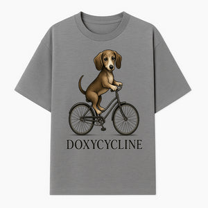 Doxycycline Dog Bicycle Art Print | Cute Dog Riding Bike Wall Decor | Pet Lover Gift | Whimsical Animal Illustration - T-shirt 1758347424171.jpg