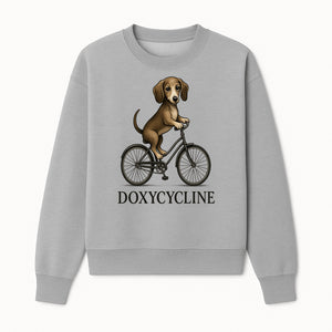 Doxycycline Dog Bicycle Art Print | Cute Dog Riding Bike Wall Decor | Pet Lover Gift | Whimsical Animal Illustration - Sweatshirt 1758347426530.jpg