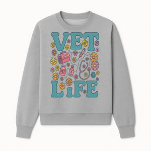 Vet Life Graphic Tee | Colorful Vet Inspired T-Shirt with Pet Icons and Flowers | Perfect Gift for Animal Lovers and Vets - Sweatshirt 1758347426579.jpg