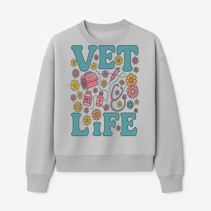 Vet Life Graphic Tee | Colorful Vet Inspired T-Shirt with Pet Icons and Flowers | Perfect Gift for Animal Lovers and Vets - Sweatshirt 1758347427197.jpg