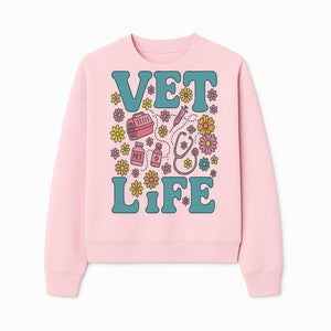 Vet Life Graphic Tee | Colorful Vet Inspired T-Shirt with Pet Icons and Flowers | Perfect Gift for Animal Lovers and Vets - Sweatshirt 1758347427472.jpg