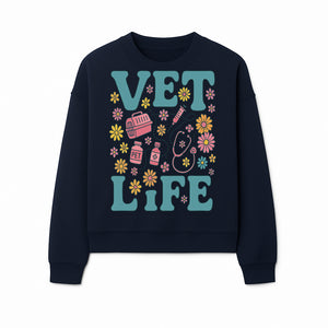 Vet Life Graphic Tee | Colorful Vet Inspired T-Shirt with Pet Icons and Flowers | Perfect Gift for Animal Lovers and Vets - Sweatshirt 1758347427780.jpg