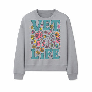 Vet Life Graphic Tee | Colorful Vet Inspired T-Shirt with Pet Icons and Flowers | Perfect Gift for Animal Lovers and Vets - Sweatshirt 1758347428074.jpg
