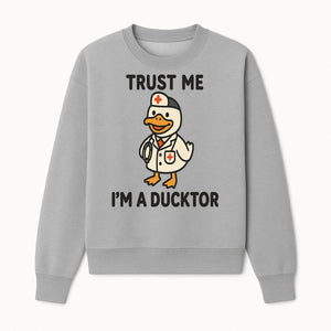 Trust Me, I'm a Ducktor Funny Medical Duck T-Shirt - Cute Nurse Gift for Doctor, Healthcare Worker, or Animal Lover - Sweatshirt 1758347435439.jpg
