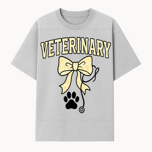 Veterinary Logo Design with Bow and Paw Print for Pet Care Businesses - T-shirt 1758347440263.jpg