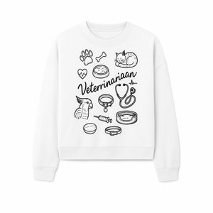 Veterinarian-Themed Wall Art with Pets, Medical Tools, and Paw Print Illustrations for Animal Lovers and Vet Offices - Sweatshirt 1758347440394.jpg