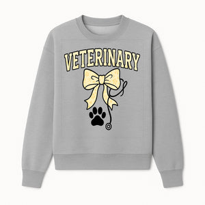Veterinary Logo Design with Bow and Paw Print for Pet Care Businesses - Sweatshirt 1758347443198.jpg