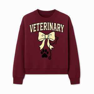 Veterinary Logo Design with Bow and Paw Print for Pet Care Businesses - Sweatshirt 1758347444169.jpg