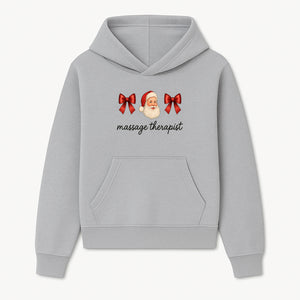 Christmas Massage Therapist Gift | Santa Illustration with Bows | Relaxation Spa Decor | Holiday Therapy Humor - Hoodie 1758350851872.jpg