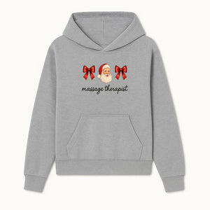 Christmas Massage Therapist Gift | Santa Illustration with Bows | Relaxation Spa Decor | Holiday Therapy Humor - Hoodie 1758350852424.jpg