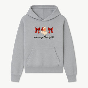 Christmas Massage Therapist Gift | Santa Illustration with Bows | Relaxation Spa Decor | Holiday Therapy Humor - Hoodie 1758350853284.jpg