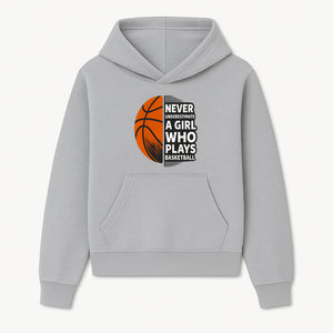Never Underestimate a Girl Who Plays Basketball T-Shirt - Motivational Sports Gift for Female Athletes - Hoodie 1758681893093.jpg