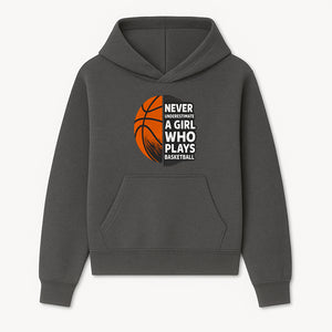 Never Underestimate a Girl Who Plays Basketball T-Shirt - Motivational Sports Gift for Female Athletes - Hoodie 1758681893412.jpg