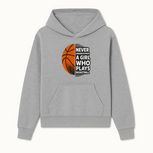Never Underestimate a Girl Who Plays Basketball T-Shirt - Motivational Sports Gift for Female Athletes - Hoodie 1758681893670.jpg