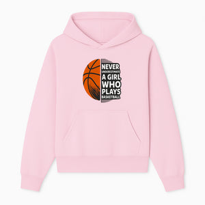 Never Underestimate a Girl Who Plays Basketball T-Shirt - Motivational Sports Gift for Female Athletes - Hoodie 1758681893975.jpg
