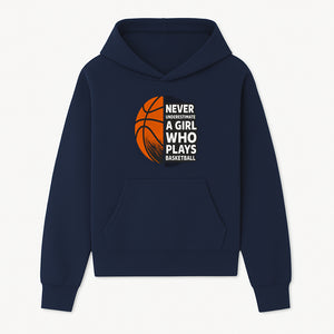 Never Underestimate a Girl Who Plays Basketball T-Shirt - Motivational Sports Gift for Female Athletes - Hoodie 1758681894269.jpg