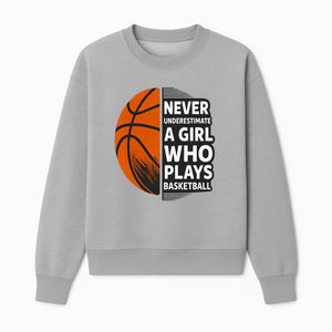 Never Underestimate a Girl Who Plays Basketball T-Shirt - Motivational Sports Gift for Female Athletes - Sweatshirt 1758681899106.jpg