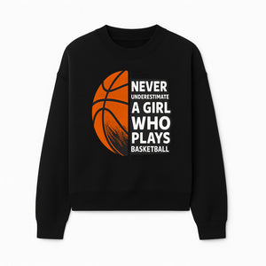 Never Underestimate a Girl Who Plays Basketball T-Shirt - Motivational Sports Gift for Female Athletes - Sweatshirt 1758681899244.jpg