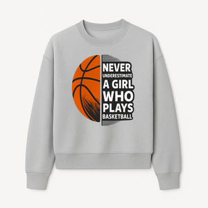Never Underestimate a Girl Who Plays Basketball T-Shirt - Motivational Sports Gift for Female Athletes - Sweatshirt 1758681899660.jpg