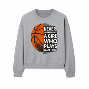 Never Underestimate a Girl Who Plays Basketball T-Shirt - Motivational Sports Gift for Female Athletes - Sweatshirt 1758681900478.jpg