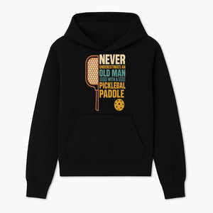 Never Underestimate an Old Man with a Pickleball Paddle - Funny Pickleball T-shirt Gift for Players and Seniors - Hoodie 1758685038272.jpg