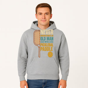 Never Underestimate an Old Man with a Pickleball Paddle - Funny Pickleball T-shirt Gift for Players and Seniors - Hoodie 1758685040924.jpg