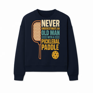 Never Underestimate an Old Man with a Pickleball Paddle - Funny Pickleball T-shirt Gift for Players and Seniors - Sweatshirt 1758685045458.jpg