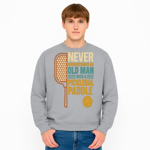 Never Underestimate an Old Man with a Pickleball Paddle - Funny Pickleball T-shirt Gift for Players and Seniors - Sweatshirt 1758685046994.jpg