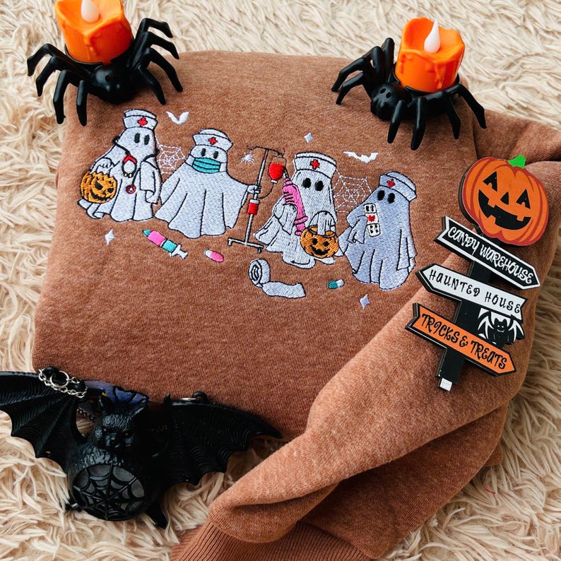 Embroidered Ghost Nurse Halloween Sweatshirt Spooky Season Crewneck 1758703689340.jpg