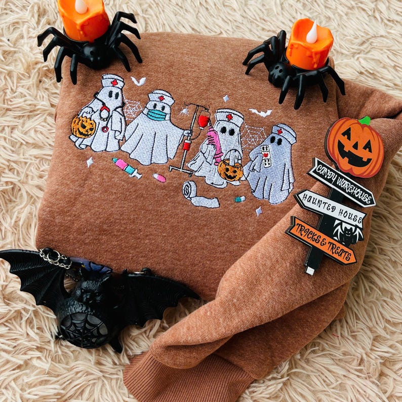 Embroidered Ghost Nurse Halloween Sweatshirt Spooky Season Crewneck 1758703689463.jpg