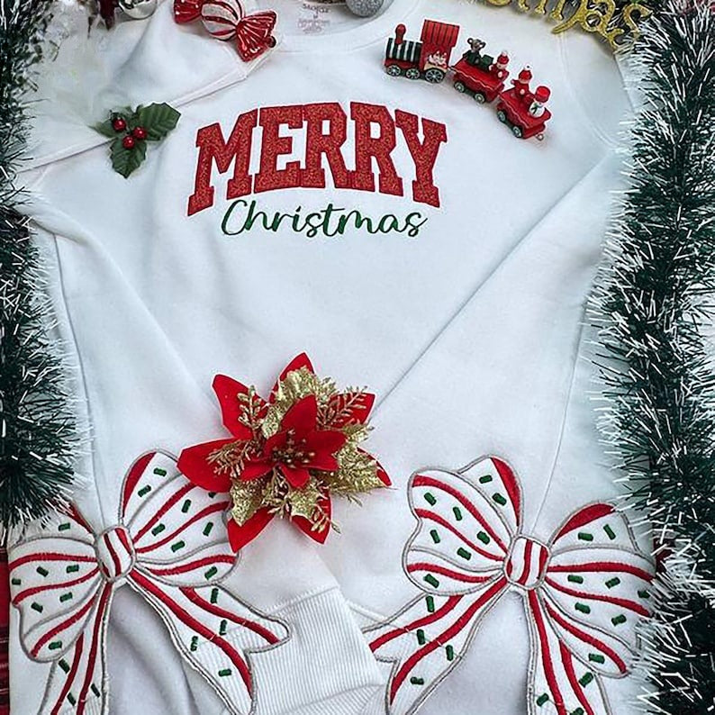 Merry Christmas Side Bow Embroidered Sweatshirt Glitter Applique Christmas Shirt Christmas Side Bow Christmas Sweatshirt Holiday Apparel 1760431928676.jpg