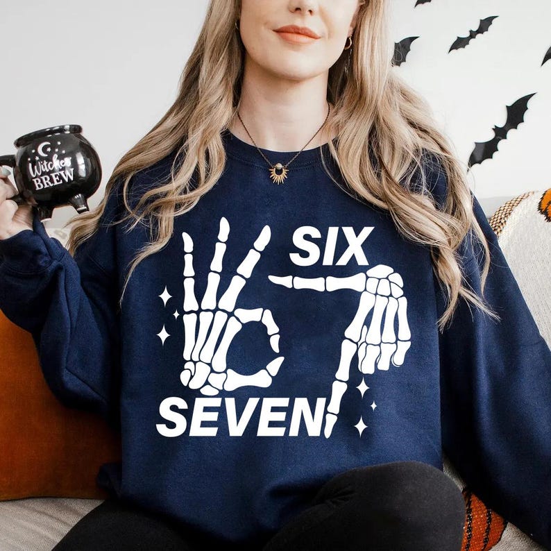 Six Seven 6 7 Meme Funny Skeleton Hands Shirt Funny Halloween Bones Shirt Spooky Skull Shirt Skeleton Hand Shirt 1760688201391.jpg
