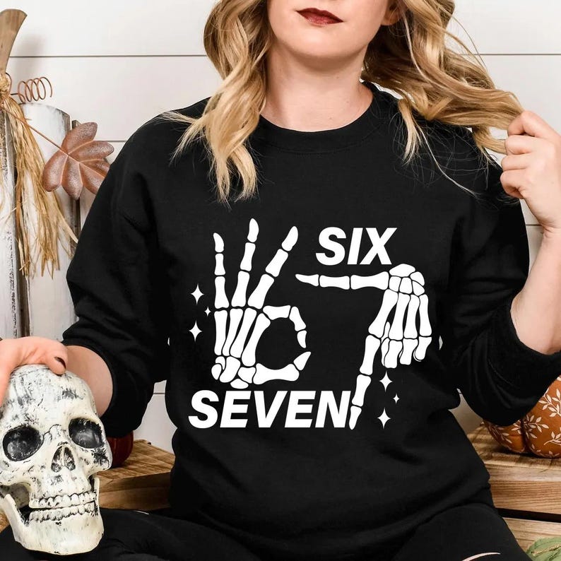 Six Seven 6 7 Meme Funny Skeleton Hands Shirt Funny Halloween Bones Shirt Spooky Skull Shirt Skeleton Hand Shirt 1760688201398.jpg