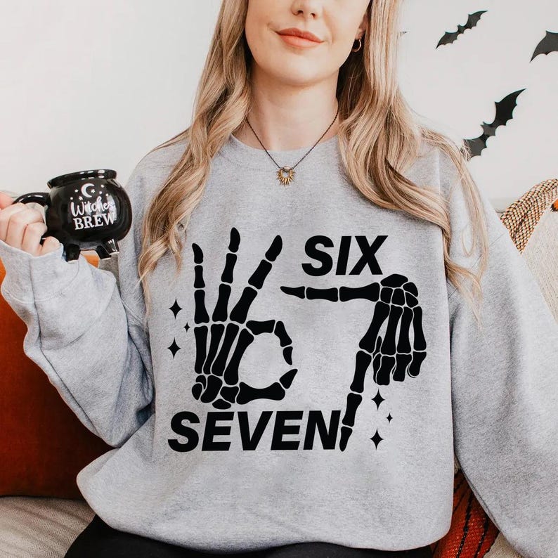 Six Seven 6 7 Meme Funny Skeleton Hands Shirt Funny Halloween Bones Shirt Spooky Skull Shirt Skeleton Hand Shirt 1760688201399.jpg