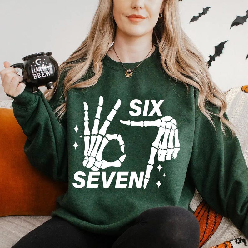 Six Seven 6 7 Meme Funny Skeleton Hands Shirt Funny Halloween Bones Shirt Spooky Skull Shirt Skeleton Hand Shirt 1760688202012.jpg