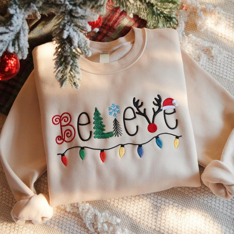 Embroidered Believe Christmas Sweatshirt Festive Holiday Crewneck 1762938392521.jpg