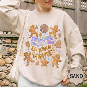 Christmas Gingerbread Dancing Through The Lightning Strikes Sweatshirt Self Love Shirt Merry Shirt New Album 1763348426797.jpg
