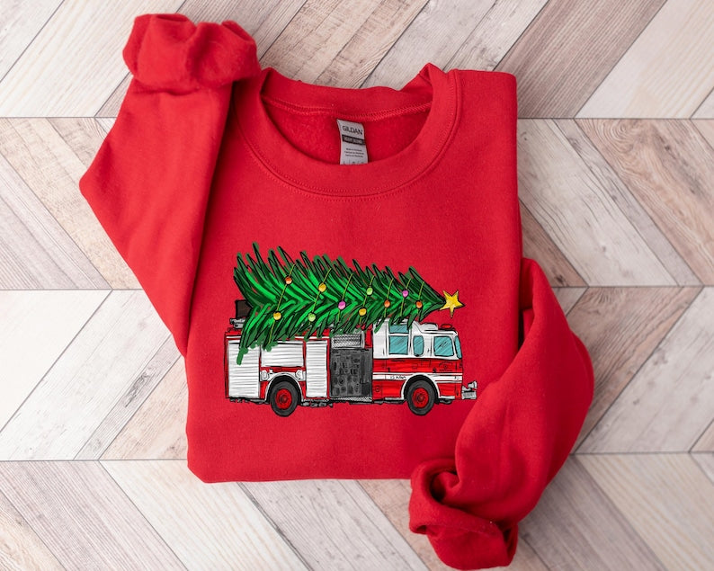Christmas Sweatshirt Christmas Tree On Fire Truck Sweatshirt Winter Sweater Firefighter Christmas Crewneck Gift For For Firefighter Hero 1764139936163.jpg