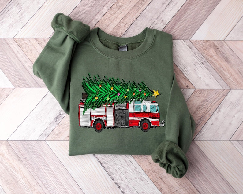 Christmas Sweatshirt Christmas Tree On Fire Truck Sweatshirt Winter Sweater Firefighter Christmas Crewneck Gift For For Firefighter Hero 1764139936190.jpg