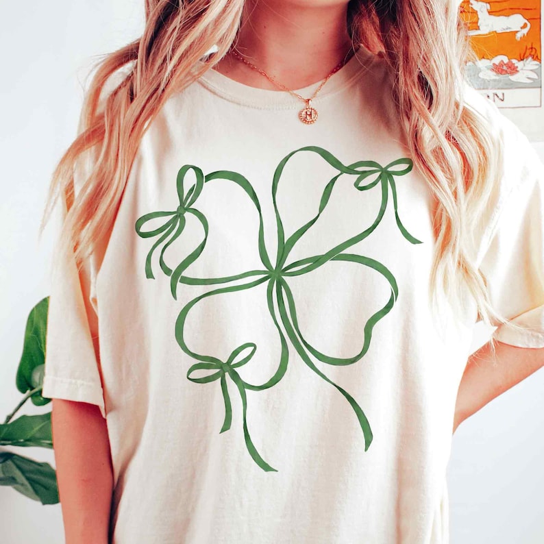 Preppy Shamrock St Patricks Day Coquette Bow Shirt Lucky Shirt St Pattys Day Shirt Trendy Irish Shirt St Patricks Day Shirt 1770026972677.jpg