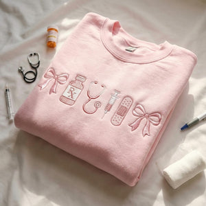 Embroidered Custom Nurse Sweatshirt Medical Crewneck Cute Healthcare Gift For Her Medical Assistant Embroidered Sweatshirt Rn 1770176305075.jpg