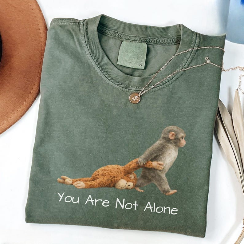 Monkey Punch T Shirt Baby Monkey Holding Plush Toy Animal Lover Gift Viral Monkey Shirt Cute Cozy Shirt Wildlife Shirt 1773634488141.jpg