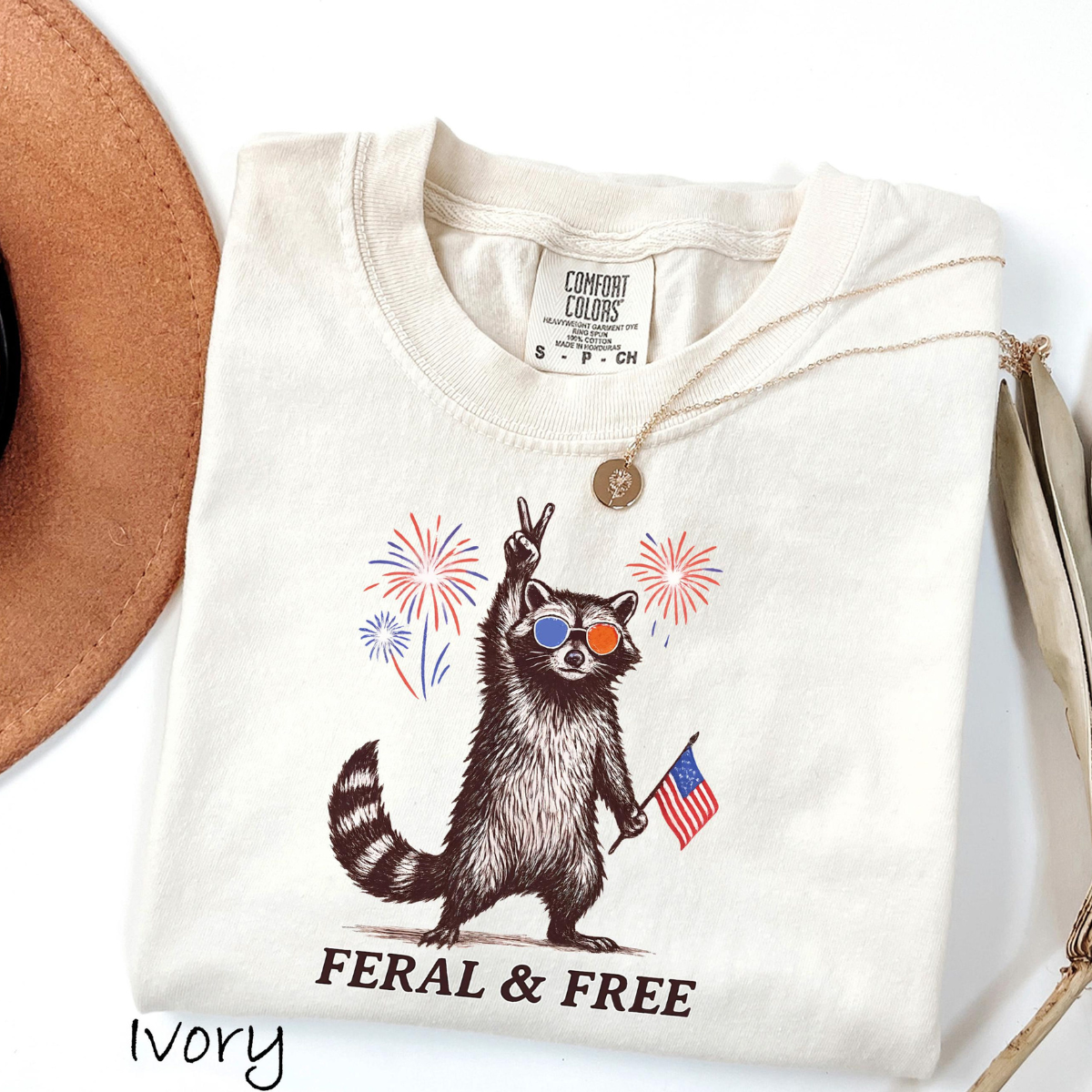 Comfort Colors Feral But Free Raccoon Shirt Funny 4th Of July Tee Patriotic Raccoon Shirt Independence Day Outfit Usa Raccoon Tee 1782099943722.png