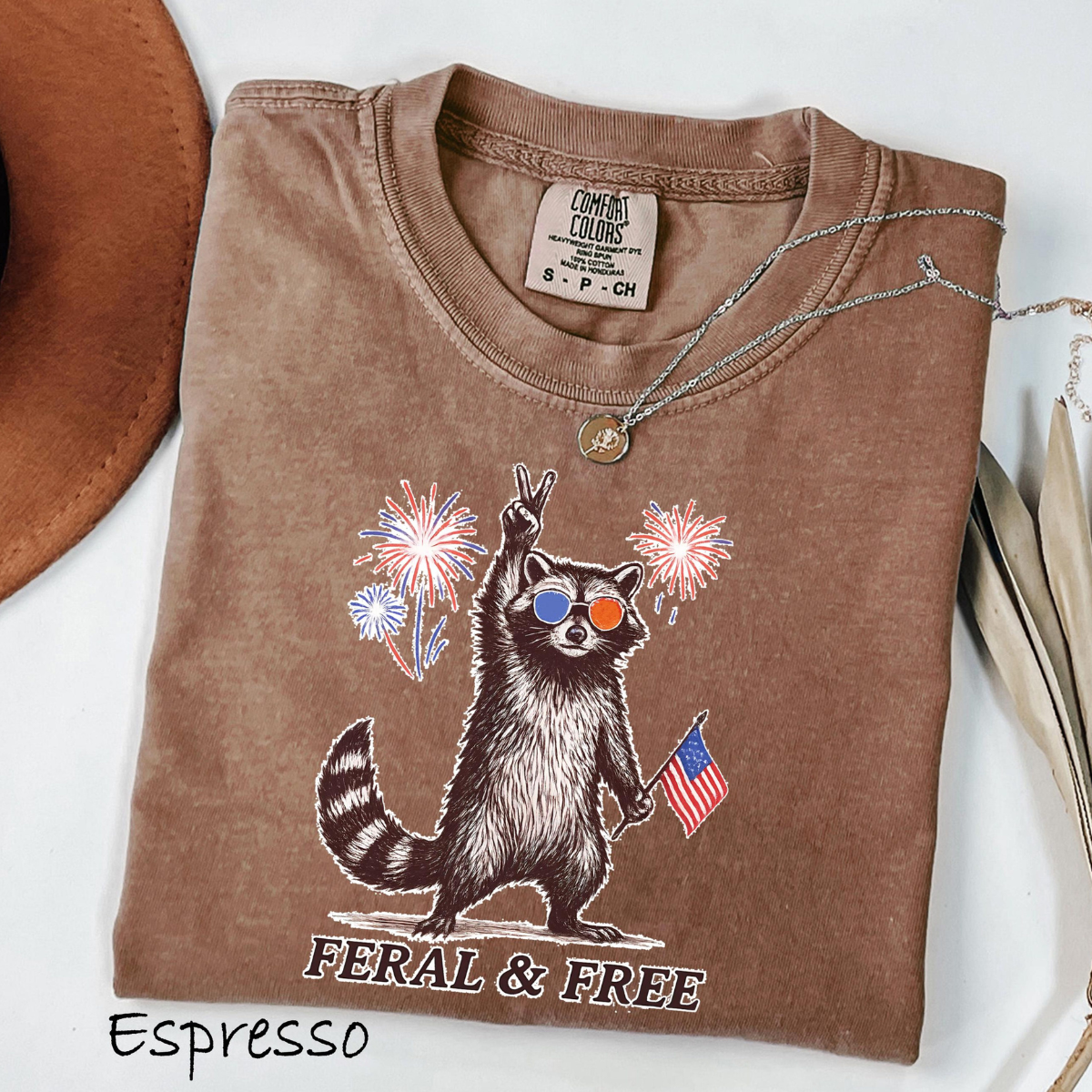 Comfort Colors Feral But Free Raccoon Shirt Funny 4th Of July Tee Patriotic Raccoon Shirt Independence Day Outfit Usa Raccoon Tee 1782099944051.png
