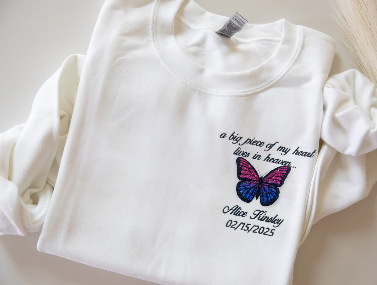 Embroidered Butterfly Memorial Hoodie - Custom Name, Date & Quote Sweatshirt - A Big Piece of My Heart Lives In Heaven 1_23c35da7-bcef-47bc-acee-8bd79d91051f.jpg