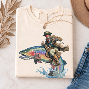 Cowboy Riding Rainbow Trout T-Shirt - Genuine Comfort Colors - Cowboy Fishing Club Rodeo Graphic Tee - Unique Gift For Family 27a28b25-67b4-4daf-8ec6-954528e78ca8-gr2.png