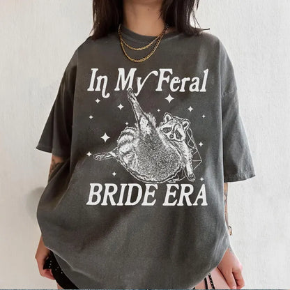 In My Feral Bride Era Shirt, Funny Raccoon, Funny Bride Shirt, Gift For Bride To Be, Engagement Gift, Wedding Planning, Bridal Meme Shirt 5efcc01e-ab04-4a1f-b108-569491caf37c-dgfdfrewtyjhj-4-.webp