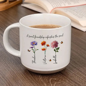 A Sweet Friendship Refreshes The Soul Besties Birth Flower - Personalized Pottery Mug - Friendship Gift For Best Friends 7d03b680-0fe0-4037-b5fc-ecb86837707f-banner-1.webp