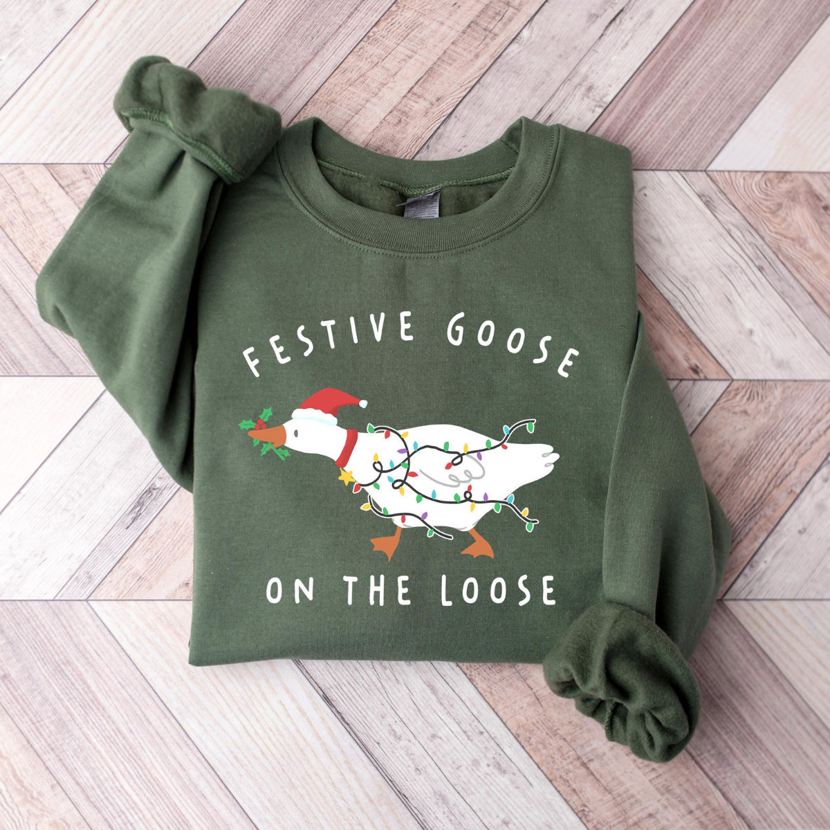 Festive Goose On The Loose Christmas Funny Goose Holiday Sweatshirt, Cute Xmas Duck Shirt, Silly Goose Hoodie, Xmas Gift For Her Shirt 969082d6-d24d-48f7-b75c-83797e262a37-5.png